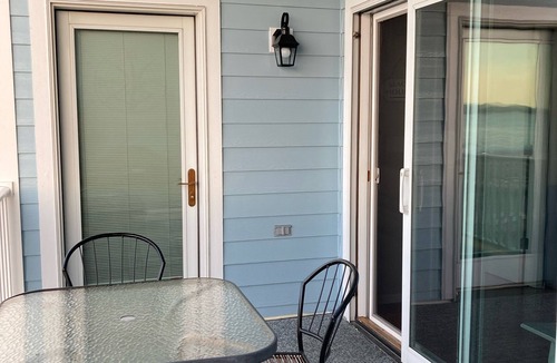 East Jordan Condo | South Shore Haven - Lake Charleviox Waterfront Condo