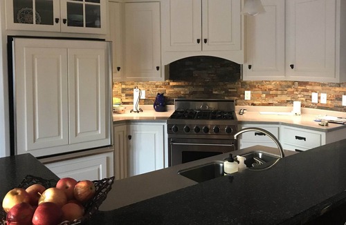 Neenah House | Spacious 3+ bedroom home with fun basement game room only 22 minutes from EAA!