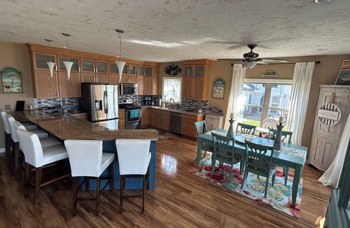 Houghton Lake House | Spacious 4-bedroom lakefront house on Houghton Lake with beach and tiki bar
