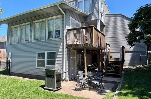 Sioux Falls House | Spacious 4-BR, 2.5 Bath vacation home: Foosball, 65" TV, Golf, 4 Season Room