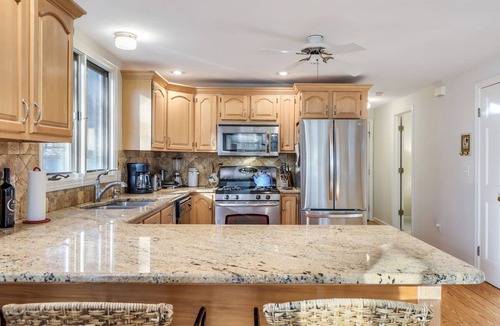 Brewster House | Spacious 4BR/3BA home only .4 mile to Ellis Landing Beach