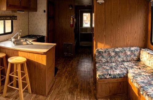 Babbitt Boat Rental | Spacious Getaway Series Cabin-Style Boat with Water Slide Near Babbitt, MN