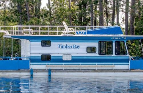 Babbitt Boat Rental | Spacious Getaway Series Cabin-Style Boat with Water Slide Near Babbitt, MN