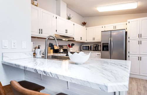 Traverse City House | Spacious lake house north of TC. A/C. Dock, kayaks. Pet ok