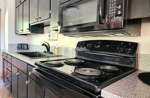 Logan Cabin | Spacious Lodge with Stocked Pond, Hot Tub, Games