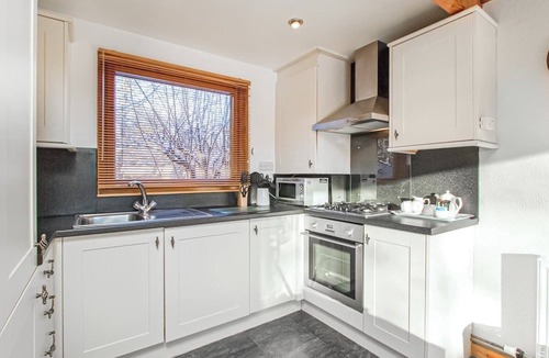Whitebridge Ski Chalet | Spacious riverside lodge with mountain views.