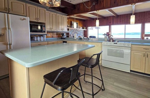 Frankfort House | Spacious vacation gem on Crystal Lake w/gas fireplace, WiFi, central AC, firepit