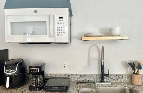 Central Oklahoma City Apartment | Studio near Integris with a desk — set up for monthly medical & work stays. #MR