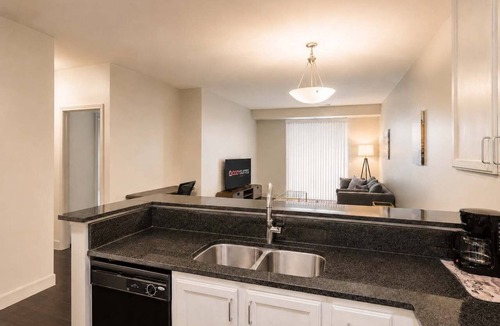 Central Business District Apartment | Stunning 1BR/1BA CozySuites at the Banks
