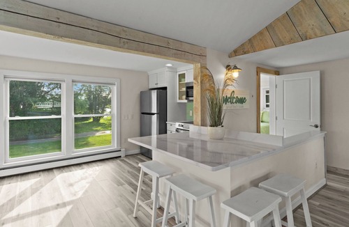 Kenyon Cottage | Stunning waterfront home with big yard & dock! Voted #1 rental in all of RI!