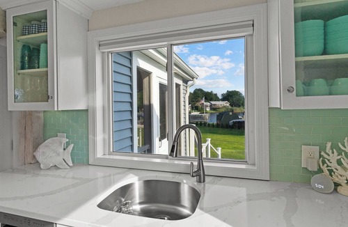 Kenyon Cottage | Stunning waterfront home with big yard & dock! Voted #1 rental in all of RI!