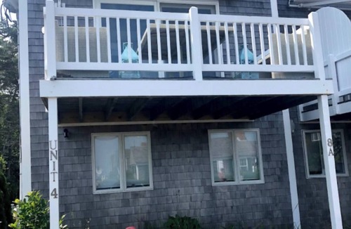 Provincetown Condo | Stunning West End Condo with 2 bedrooms , large backyard and views of the bay