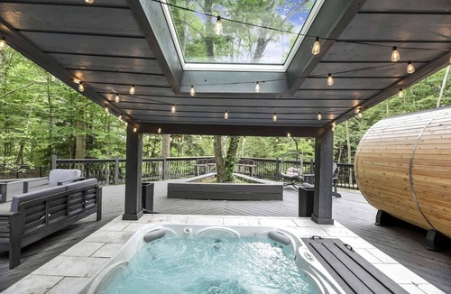 Willoughby Hills House | Stupendous Home Retreat with Indoor Pool & Outdoor Hot Tub, Sauna, In the Woods