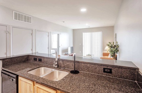 Central Business District Apartment | Stylish 1BR/1BA CozySuites at the Banks