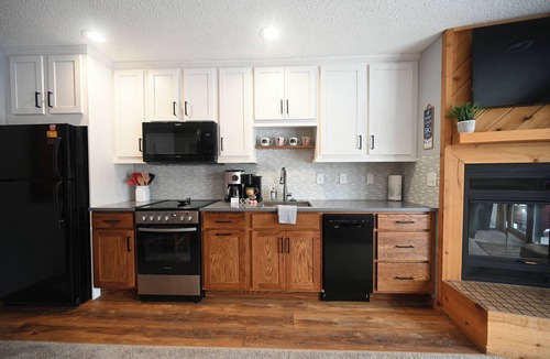 Bellaire Condo | Summer fun! Close to lakes, sleeps 6, 2 bath. Outdoor and indoor pools.