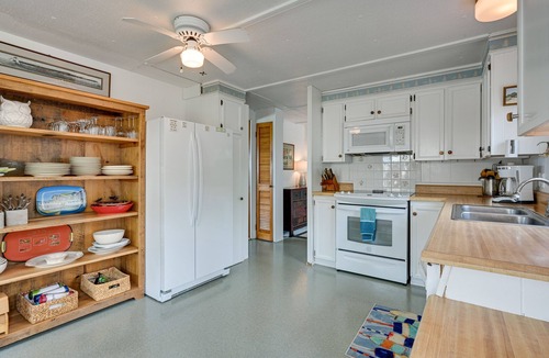 Tawas City Cottage | 'Summer Place' A Vibrant Rental on Lake Huron