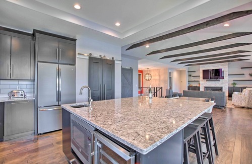 Traverse City House | Sunroom + Hot Tub! Waterfront Silver Lake Home