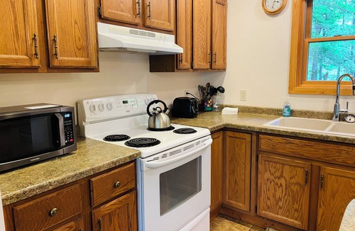 Hayward House | Sunset on the Bay | Vacation rental on Nelson | Lakefront | Private Dock