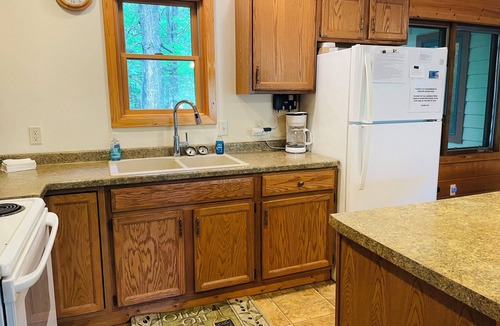 Hayward House | Sunset on the Bay | Vacation rental on Nelson | Lakefront | Private Dock