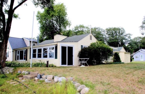 Gaylord Cottage | Sunshine Cottage on 100’ of sandy Otsego Lake. Gaylord, Mi. Boat, golf, relax