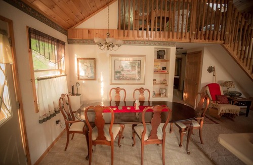 Finlayson House | The Cedar House Is Uniquely Set In The Forest Surrounded By Decks And Porches.
