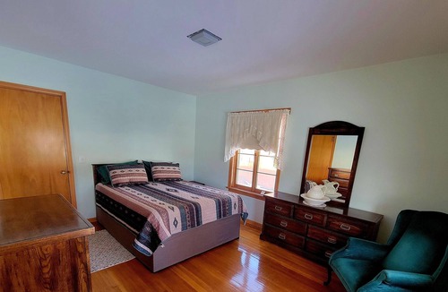 Terry House | The Cozy Cottage is nestled in a charming neighborhood for the perfect get-away.