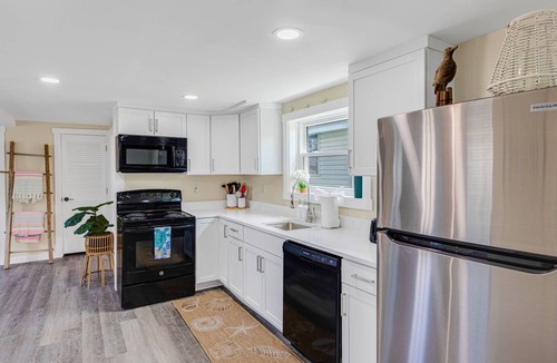 Salisbury Condo | The Hangout: Across from Beach Access, New & Fun Decor, Firepit, Gas Grill