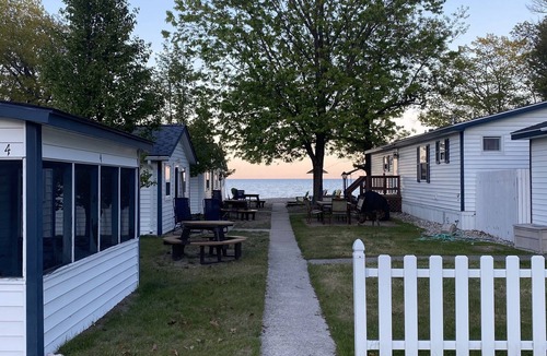 Oscoda Cottage | The Hideaway- Haven on HuronnA fresh and airy cabin directly on Lake Huron!