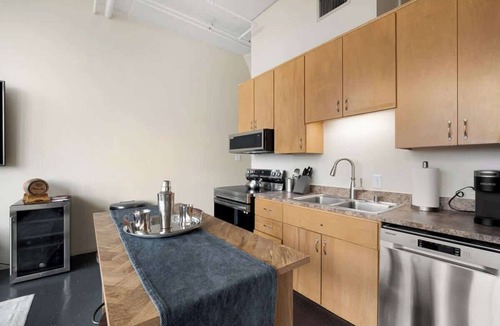 West Main Historic District Apartment | The Secretariat in Downtown Louisville with River View