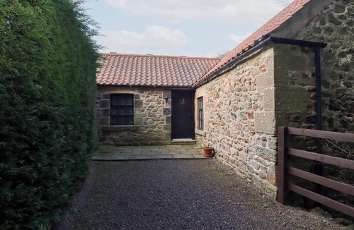 Akeld Cottage | THE SMITHY, romantic, character holiday cottage, with pool in Wooler