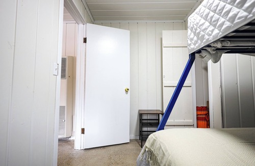 Port Austin Hotel | The Vintage Two at Lakeshore Pines is a cozy 2 bd/1ba unit with Beach Access!