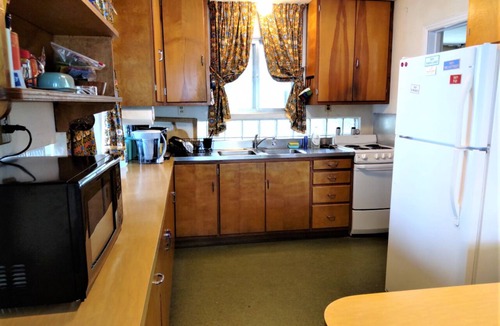 Rapid City House | Torch Lake with Sandy beach frontage