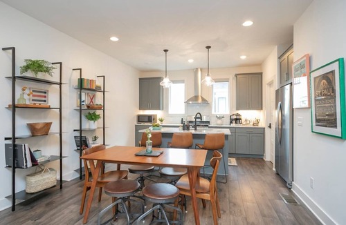 Katie Hill Neighborhood House | Townhome with Balcony Suites & Garage