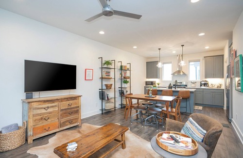 Katie Hill Neighborhood House | Townhome with Balcony Suites & Garage