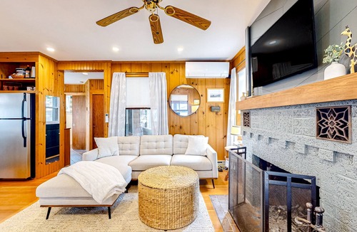 Raymond Cottage | Tranquil cottage near beach with private dock, spacious patio & modern comforts