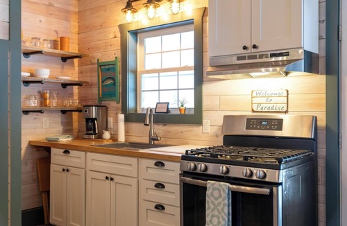 Carp Lake Cabin | Tranquil Retreat Among the Trees - Year-Round Adventure with Water Access