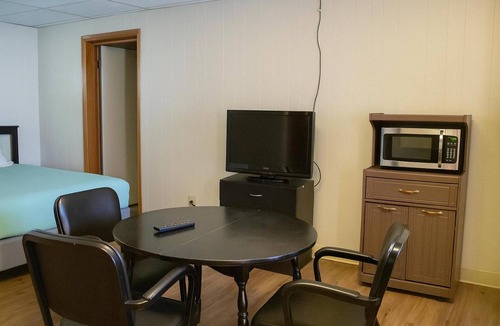 Wolf Point Hotel | Tranquil & Welcoming Room for Travelers | Prairie Cinema - 0.5 miles