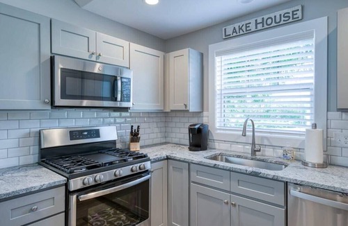 Greilickville Condo | Traverse City's West Bay Getaway - Dog Friendly!