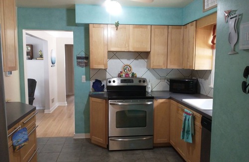 Grand Haven House | Tropical Vibe Ranch Home - Minutes to beach & downtown,relax in the backyard