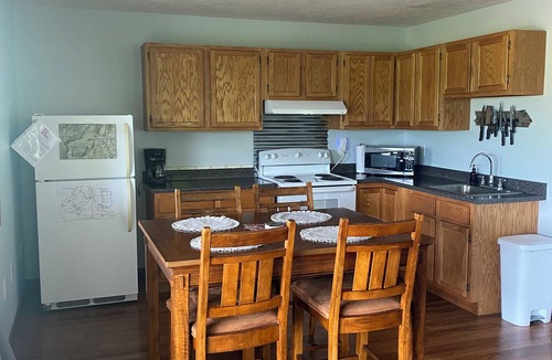 Logan Cottage | Two bedroom cabin with hot tub and sunset views
