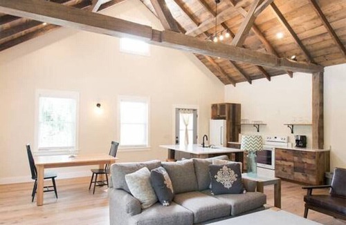 Millersburg Apartment | Unique Rustic Suite with Jacuzzi Tub, Kitchen, Fireplace, and Living Room