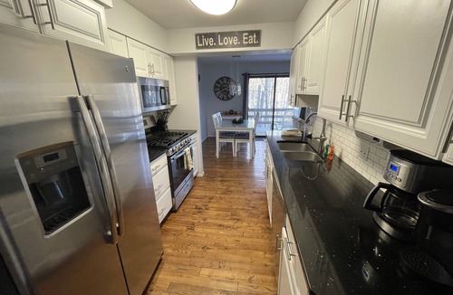 Harbor Springs Condo | Updated wooded 3 BR end unit condo, sunrise view, pool, trails, close to Lake MI