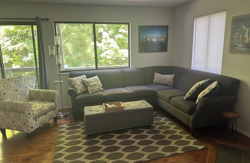 Harbor Springs Condo | Updated wooded 3 BR end unit condo, sunrise view, pool, trails, close to Lake MI