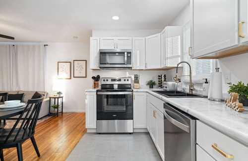 Evansville House | Urban Oasis: A Charming Downtown Retreat with Game Room, Firepit and Yard Games
