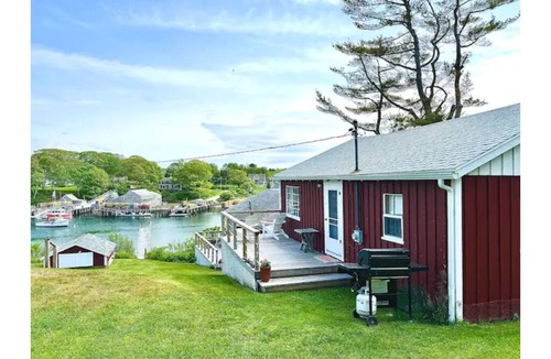New Harbor Cottage | Vintage cabin perched on edge of harbor with dock