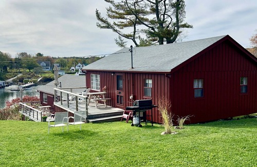New Harbor Cottage | Vintage cabin perched on edge of harbor with dock