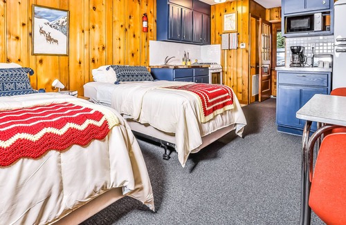 Presque Isle House | Vintage waterfront suite on South Turtle Lake with on-site dock & rowboats