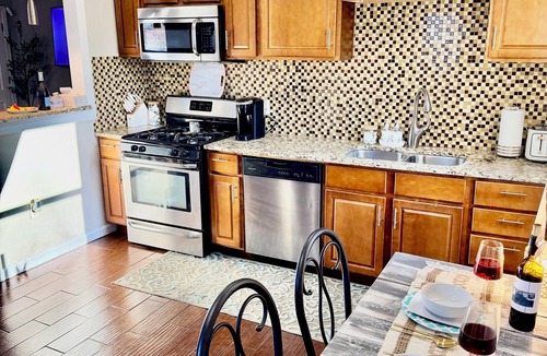 Central Oklahoma City House | Walk to OCU Lazy Leopard Lounge Stylish OKC Stay 2 bedroom KING & QUEEN