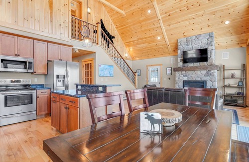 South Pond Shores Ski Chalet | Waterfront Chalet: 4BR Luxury w/Game Room, Private Dock & Minutes to Skiing!