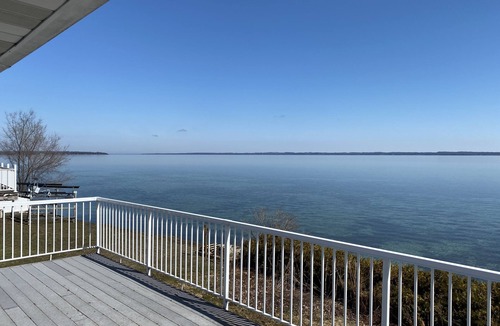 Suttons Bay House | Waterfront Home with Cottage Charm